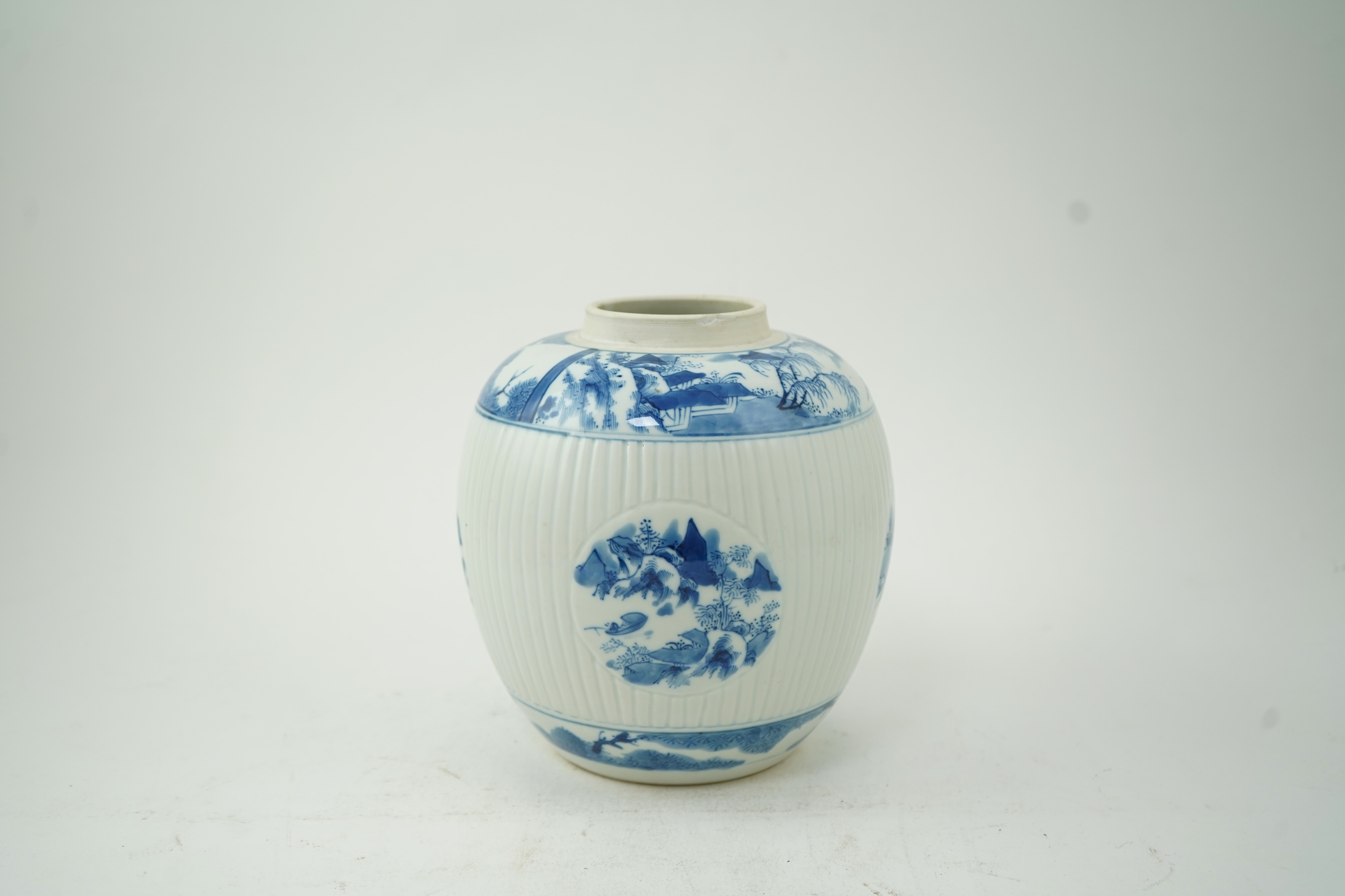 A Chinese blue and white ribbed ovoid jar, in Kangxi style, late 19th/early 20th century